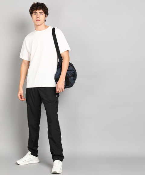 REEBOK Solid Men Black Track Pants Buy REEBOK Solid Men Black