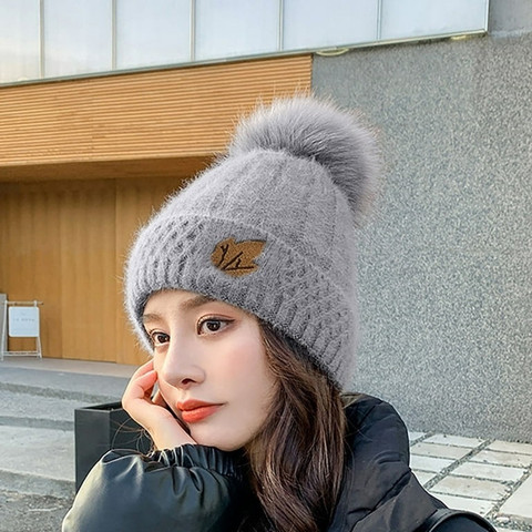 REFFER Women's stylish winter woolen cap soft warm fur inside pom