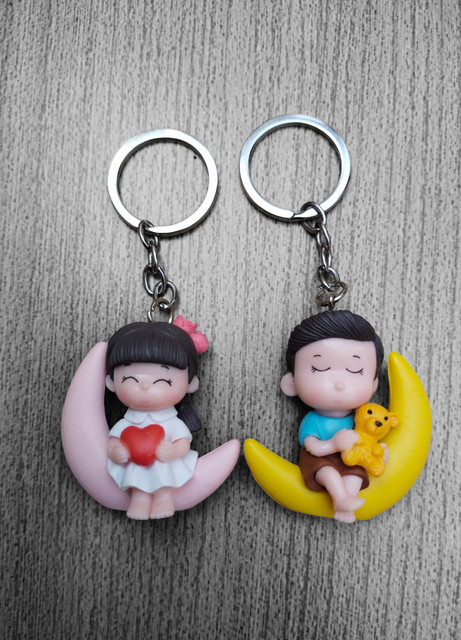 JNDecor Sweet Love Couple Unique Design Ceramic Toy keychain for Couples  (Multicolour) Key Chain