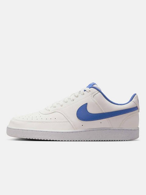 white nike shoes with blue tick
