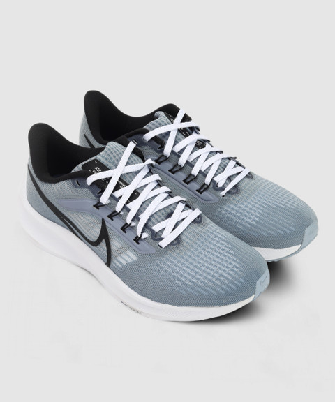 grey nike sports shoes