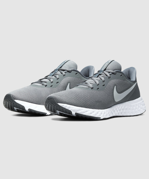 grey nike revolution