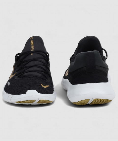 nike free run black and gold