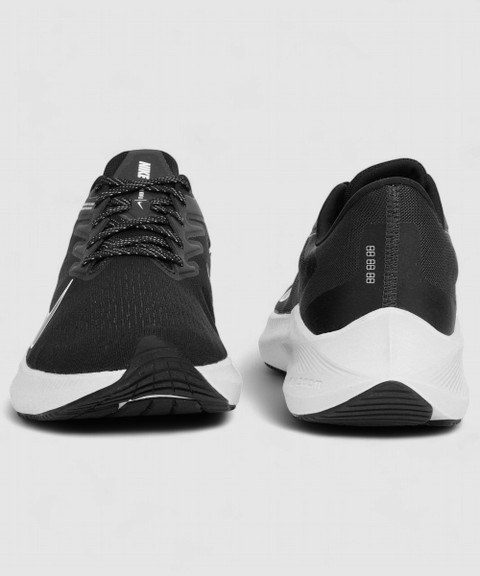 black shoes with white sole nike