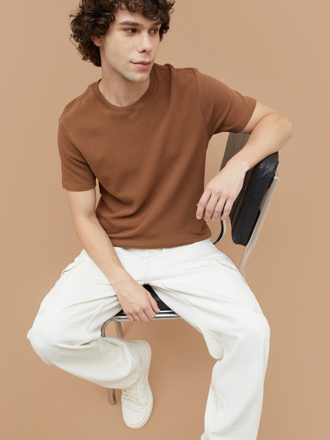 Fame Forever by Lifestyle Solid Men Round Neck Brown T-Shirt Buy