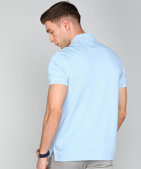 TOMMY HILFIGER Solid Men Polo Neck Light Blue T-Shirt Buy TOMMY