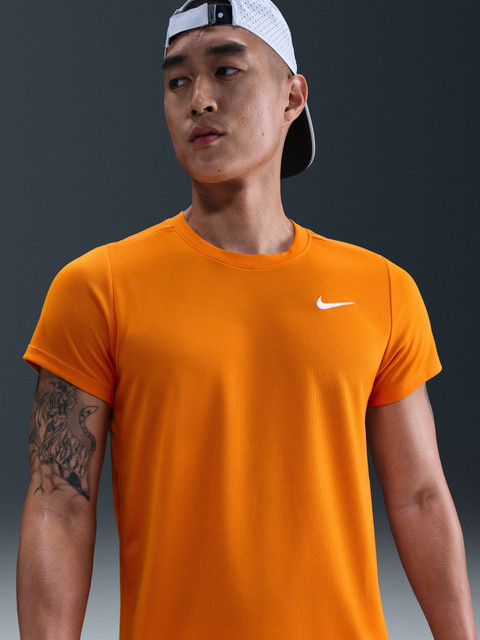 yellow orange nike shirt