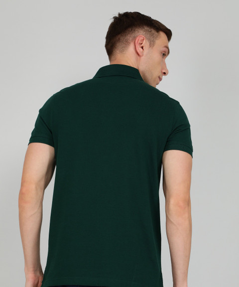 TOMMY HILFIGER Solid Men Polo Neck Green T-Shirt Buy TOMMY