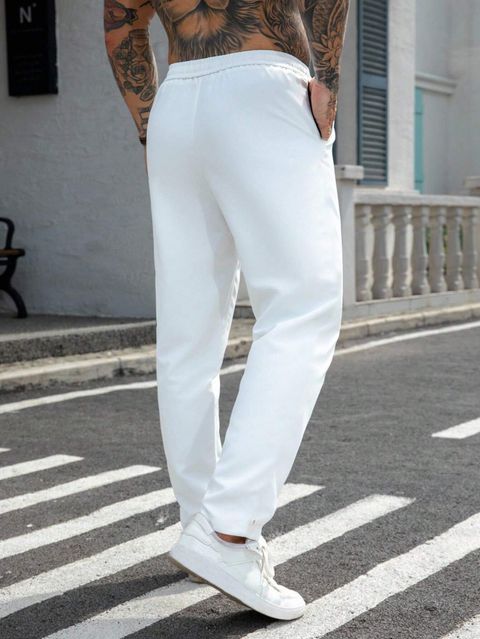 ROVELIQ Men Solid White Track Pants - Image 8