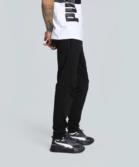 PUMA ESS Zippered Jersey Pants op Solid Men Black Track Pants
