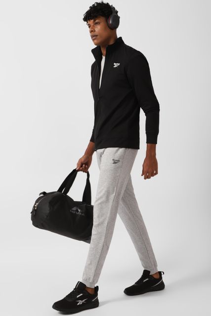 Reebok Men Solid Sports Jacket - Image 8