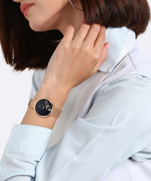 Titan NQ95083WM01 Purple Stellar Analog Watch For Women Buy