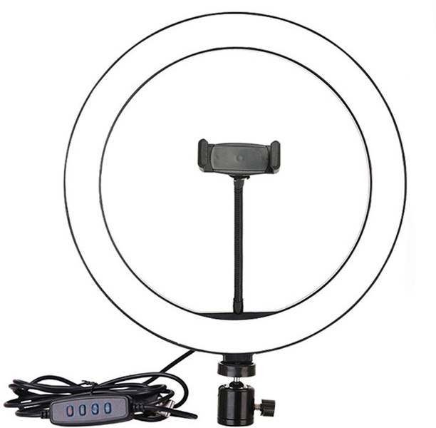 Wanzhow Portable & Lightweight Big LED Ring Light with 3 Coloring Brightness Level for Video Shooting | Photo-Shoot | YouTube | Blog's & Many More 26 Cm Lightdow Big/Small Dimmable Led Studio Camera Ring Light Phone Video Light Lamp Ring Table Fill Light Big Selfie Ring Light Stand for Live Stream-LED Ring Light Dimmable Makeup Light with 3 Light Mode,10 Level Brightness LED Selfie Lamp Studio Photography Video Shooting, Streaming Easy To Create Any Lighting Effect You Like Photo Studio Light to Capture Your Photo and Video at Musically and Other Phone's App Photo Lighting Mobile selfie Night LED Selfie Ring Light everybody want to buy this ergonic design sefie ring light flash for your mobile camera Compatible with Camera, Android and iOS Devices LIGHTWEIGHT AND ADJUSTABLE Ring Flash