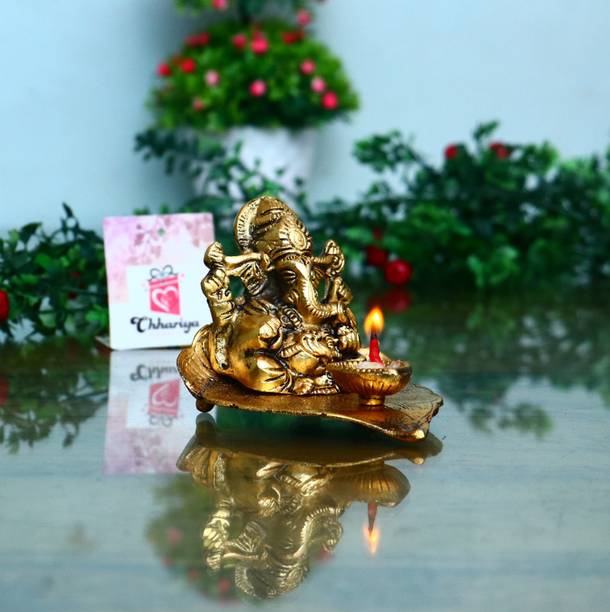 Chhariya Crafts Lord Ganesh Sitting on Leaf With Diya Decorative Showpiece  -  8 cm