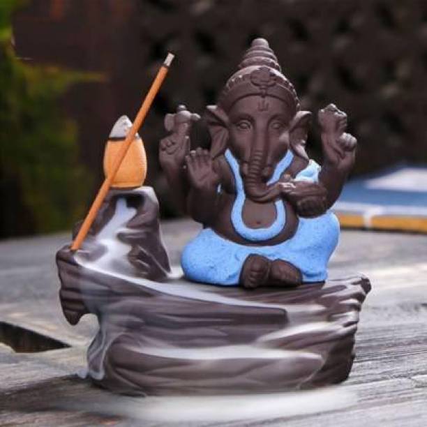 Craftomanic Handicrafted Smoke Ganesha Water Fountain Backflow incense burner with 10 Smoke Backflow Incense Cone in Incense Sticks for home|Lord Ganesha Idols for home decor|Statue of gods|God idol| Ganesha Statue|Ganesha idol for car dashboard, gifts, home &amp; Showpieces &amp; Figurines|Ganesh ji ki Murti|Statues|Statue for car|Showpieces for gift|Showpieces in home (Blue) Decorative Showpiece  Decorative Showpiece  -  12 cm