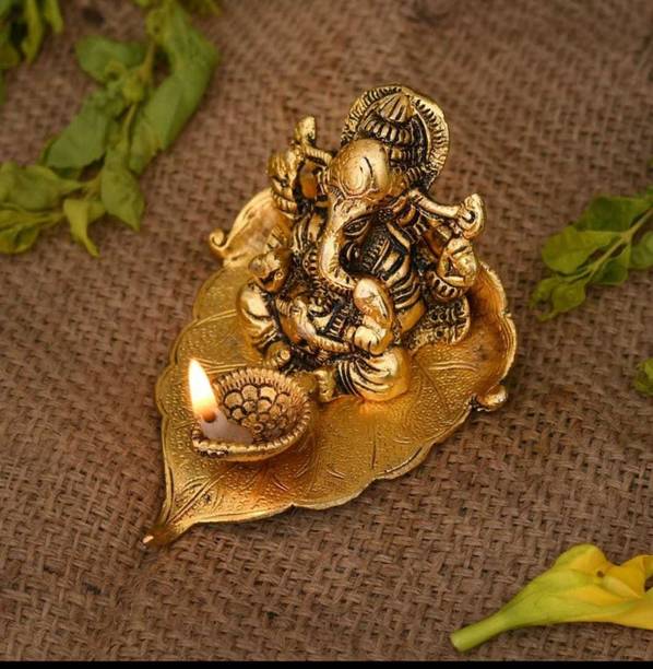 Shakuntla Handicraft Gold Plated Lord Ganesha Statue on Leaf Decorative Showpiece  -  10 cm
