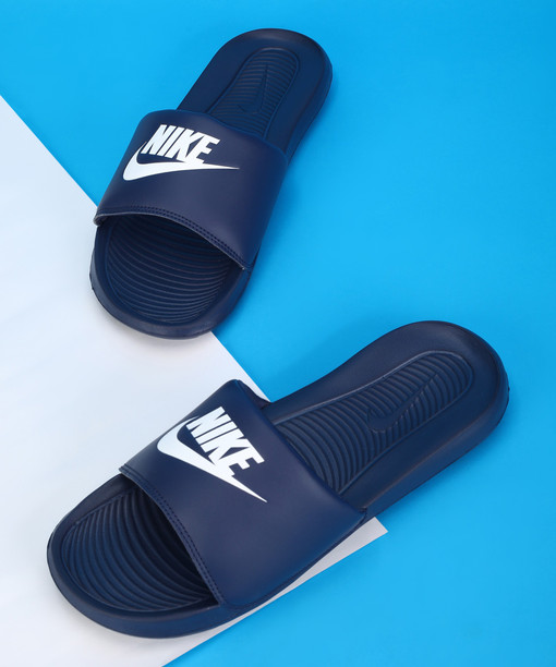 dark blue nike slides