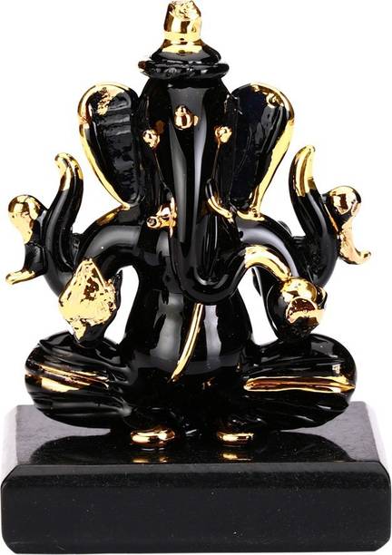 AFAST a decorative showpiece of gold plated of black ganesh . Decorative Showpiece  -  8.5 cm