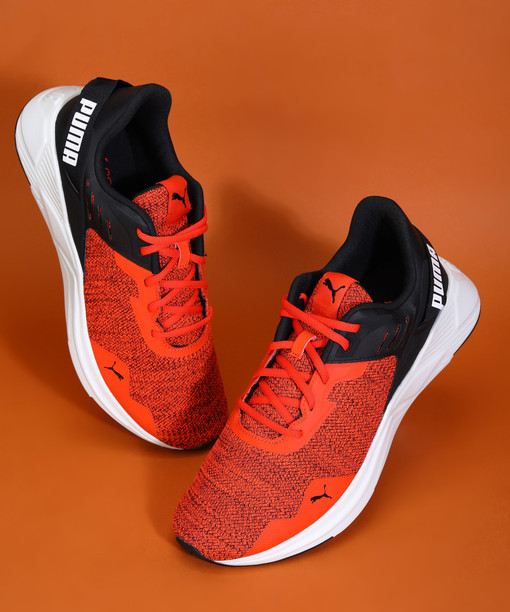 red colour puma shoes