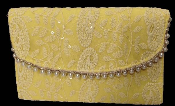 Casual Yellow  Clutch Price in India