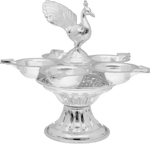 Sri Jagdamba Pearls Peacock Silver Pooja Diya Stand By Sri Jagdamba Pearls Silver Table Diya