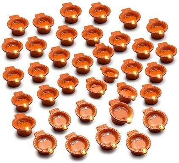 PRIDE STORE Water Sensor Light Diya For Home Diwali Navratri Laxmi Poojan Decorative diyas Plastic (Pack of 24) Table Diya