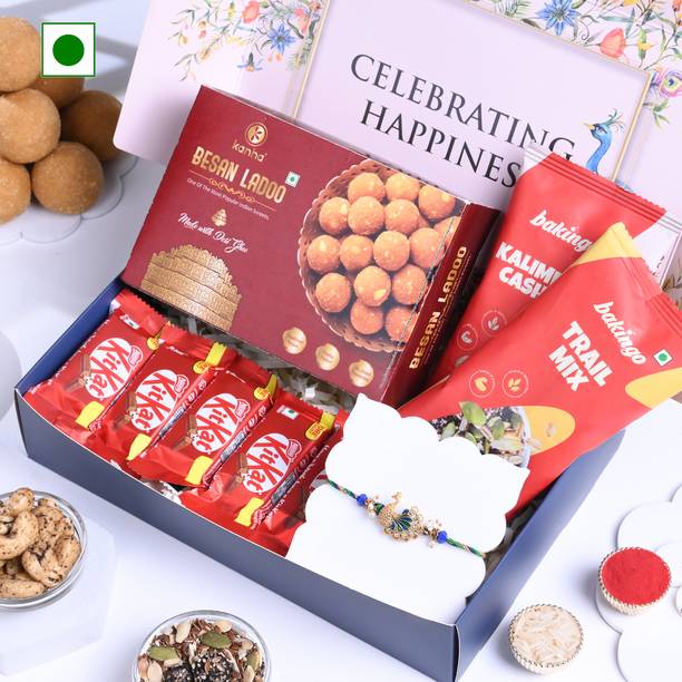 Floweraura Peacock Rakhi With 5 Chocolates Trail Mix Kaju 200g Besan Laddoo & Roli Chawal Paper Gift Box