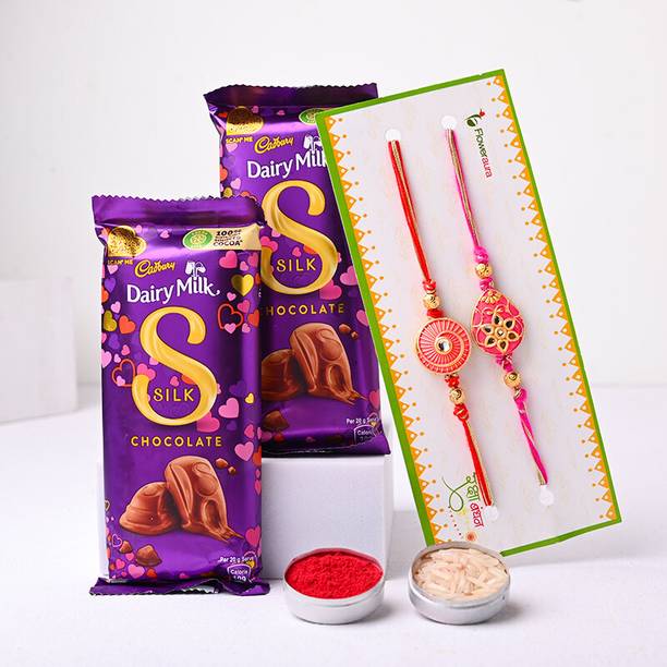 Floweraura Set of 2 Designer Rakhi With Roli, Chawal & 2 Cadbury Dairy Milk Silk Chocolate Assorted Gift Box