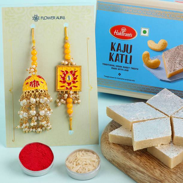 Floweraura Set Of Bhaiya Bhabhi Yellow Fancy Rakhi With Roli, Chawal & 250 Gram Kaju Katli Assorted Gift Box