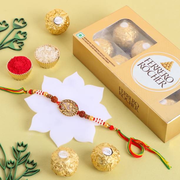 Floweraura Om Metal Dial Rakhi With Pack of 8 Choco Rolls Chocolate Paper Gift Box
