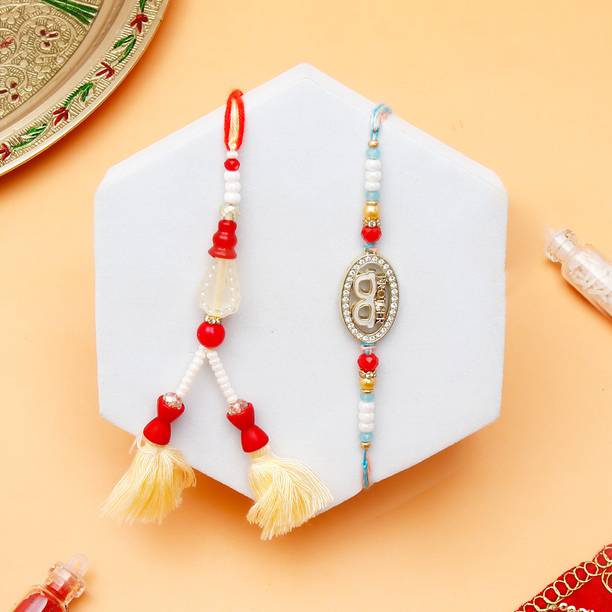 Thread Brother's Pride Charm Rakhi & Golden Tassel Lumba Rakhi Set With Greeting Card Assorted Rakhi, Greeting Card, Chawal Roli Pack Set by ARCHIES