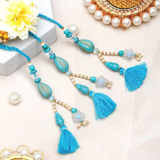 Lumba Teal Tint Lumba Designer Bhaiya Bhabhi Rakhi Set With Rakhi Greeting Card Assorted Rakhi, Greeting Card, Chawal Roli Pack Set by ARCHIES