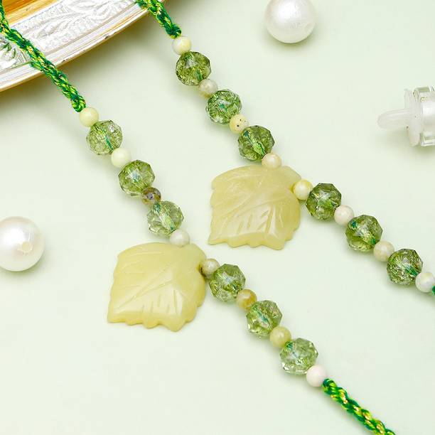 ARCHIES Thread Pack Of 2 Olive Leaf Crystal Rakhi With Rakhi Greeting Card Assorted Rakhi, Greeting Card, Chawal Roli Pack  Set