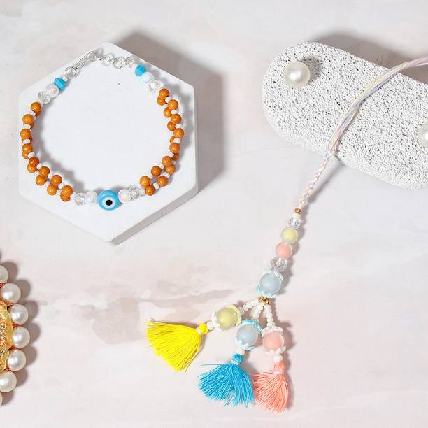 Thread Evil Eye Bracelet Rakhi & Pastel Tri-Tassel Lumba Rakhi Set With Greeting Card Assorted Rakhi, Greeting Card, Chawal Roli Pack Set by ARCHIES