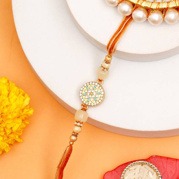 Thread Premium Golden Spinning Designer Rakhi for Brother with Rakhi Greeting Card Assorted Rakhi, Greeting Card Set by ARCHIES