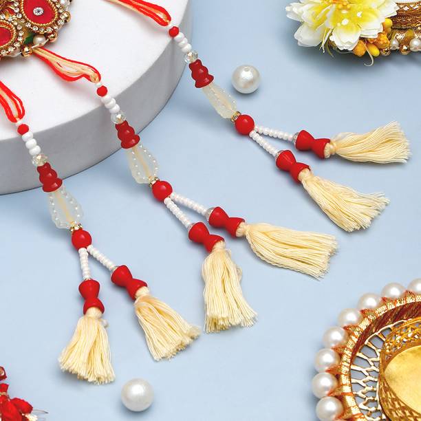 Lumba Beads & Pearls Lumba Bhaiya Bhabhi Rakhi Set With Rakhi Greeting Card Assorted Rakhi, Greeting Card, Chawal Roli Pack Set by ARCHIES