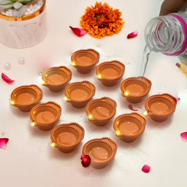 CraftVatika LED Light Water Sensor DIya Deepak for DIwali Decoration Items Plastic (Pack of 24) Table Diya Set