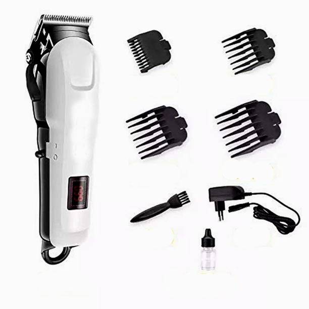 THE OM ENTERPRISE Professional hair clipper with stainless steel cutting blade Trimmer 300 min Runtime 4 Length Settings