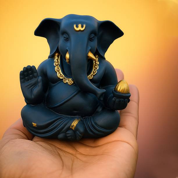 Poupee ganpati idol Decorative Showpiece  -  7 cm