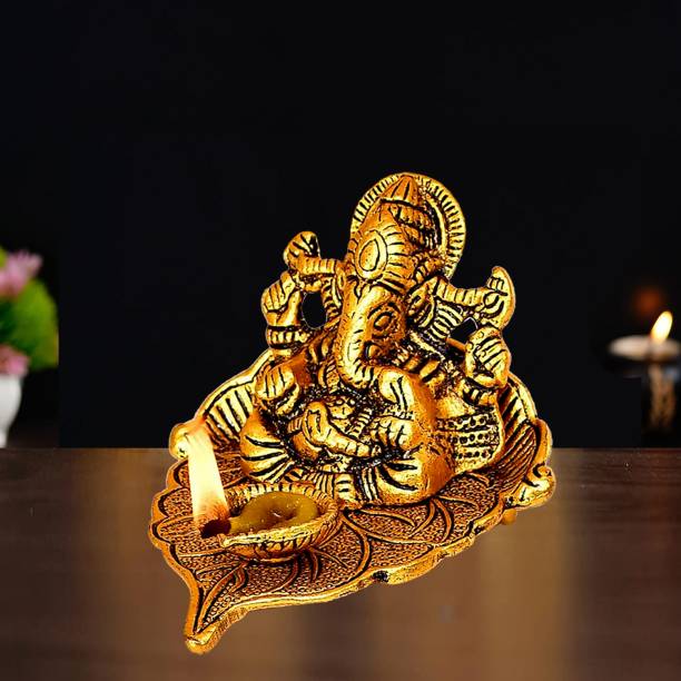 Kitlyn Ganesh ji Idol Sitting On Leaf With Diya Idol God of Wealth Prosperity Decorative Showpiece  -  8 cm