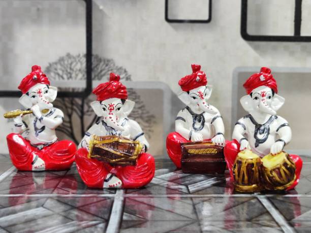 Sawcart Sawcart Lord Ganesha Musical Set of4 Statue Playing Flute Tabla Dholak Harmonium Decorative Showpiece  -  13 cm
