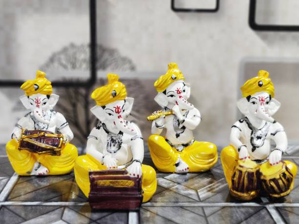 Sawcart Sawcart Lord Ganesha Musical Set of4 Statue Playing Flute Tabla Dholak Harmonium Decorative Showpiece  -  13 cm