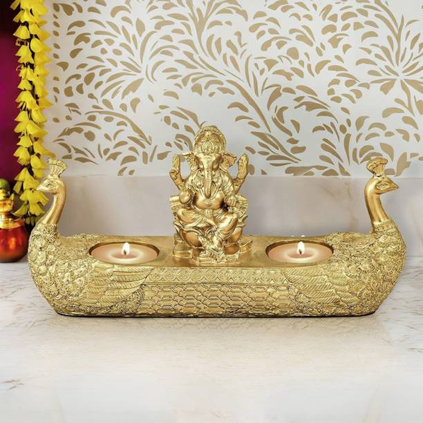 Aradhya divine Golden Lord Ganesha Idol with Dual Peacock Tealight Candle Holders Decorative Showpiece  -  14 cm