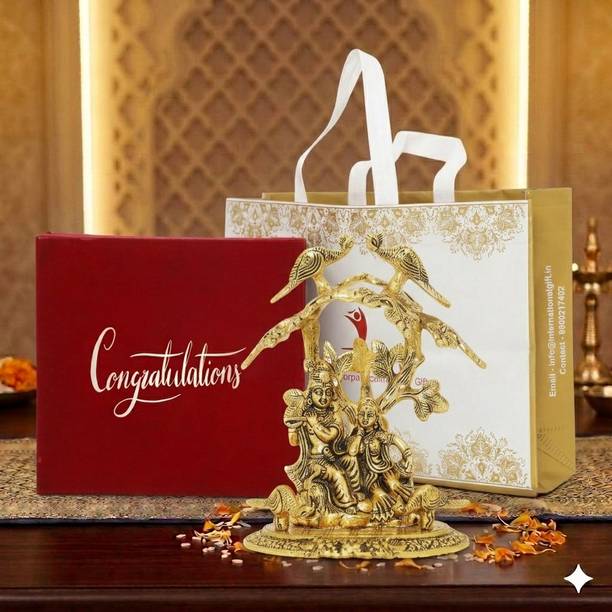 Flipkart SmartBuy Gold Plated Radha Krishna Idol Under Tree in Velvate Box & Congratulations Tag Decorative Showpiece  -  28 cm