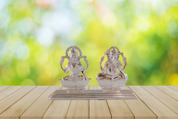 Aman jewells Pure Real 999 Silver Laxmi ji Ganesh ji Murti\Idol Decorative Showpiece  -  2 cm