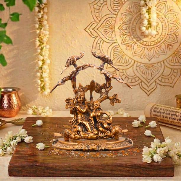 Flipkart SmartBuy Copper Plated Radha Krishna Idol Sitting Under Tree Auspicious Gift Showpiece Decorative Showpiece  -  20 cm