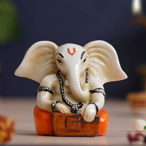 eCraftIndia White Orange Polyresin Lord Ganesha Idol Playing Harmonium Musical Instrument Decorative Showpiece  -  8 cm