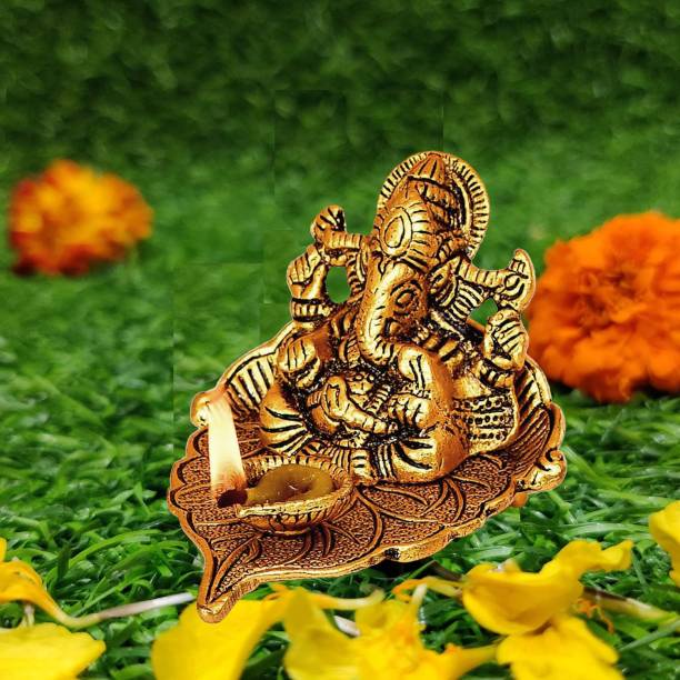 NOKTUS Ganesh ji Idol Sitting On Leaf With Diya Idol God of Wealth Prosperity Decorative Showpiece  -  8 cm
