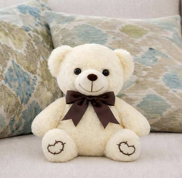 AADHYA ENTERPRISES Cream Teddy Bear with Bow Stuffed Plush Toy - 2 mm