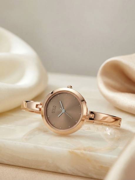 Titan Raga Viva Rose Gold Dial Rose Gold MetalStrap Analog Watch - For Women NT2593WM01,1829KL01F,2593WM01,NU2593WM01,NU2606WM05